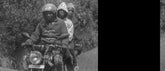 This could be a Burundian boda boda driver, or just friends/family. Whatever the case, it's quite common to ride 