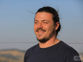 Luis Otavio Turati poses for a few photos at the end of our visit to his farm in Serra da Canastra, August 2024.