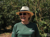 Doña Maria Doroteía smiles for the camera at her farm, Fazenda Maria, during our August 2025 visit.