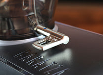 Bean hopper locks into place