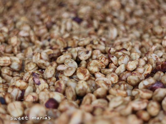 With honey process coffee, the fruit mucilage that remains intact to the bean turns a dark red color as it dries. This domed drying room is at the edge of Vereda Páramo, Aponte.