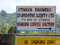 The had painted sign as you enter the Kamoini green coffee factory in near Othaya town in Nyeri, Kenya.