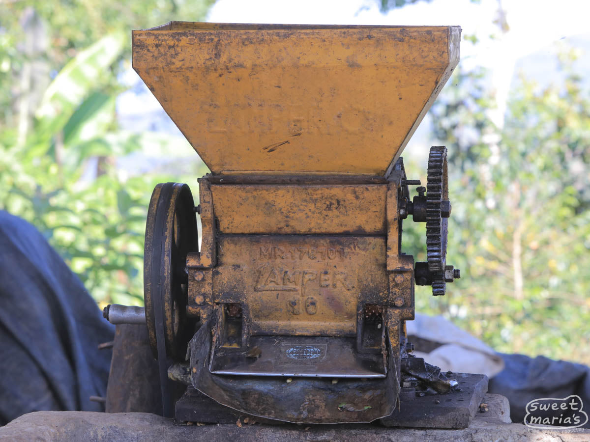 Small hand crank pulper used to remove the fruit from the coffee seed at a farm in Peru.