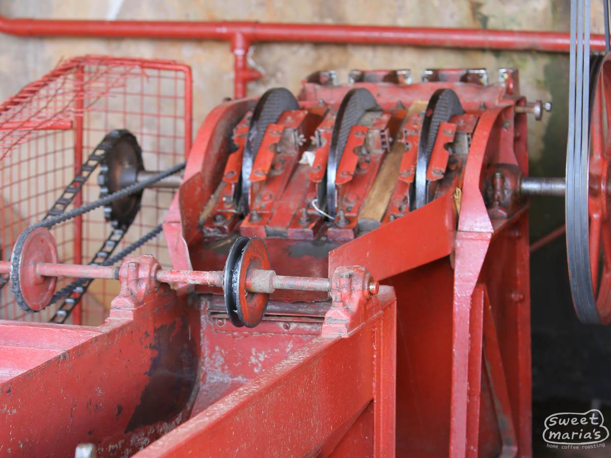 The 3-disc coffee depulper at the heart of the Kamoini coffee washing station. The first stage in processing down to green coffee. Nyeri, Kenya.