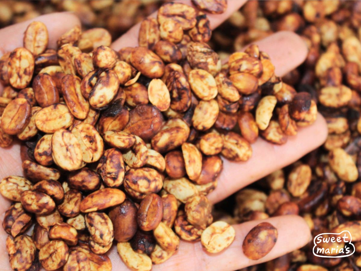 Dark red coloring of a black honey coffee at Reina Elizabeth mill in West Valley, Costa Rica.