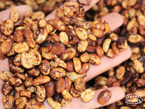 Dark red coloring of a black honey coffee at Reina Elizabeth mill in West Valley, Costa Rica.