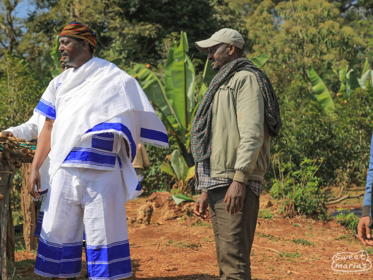 That's Tuku on the right in the green jacket at his coffee processing site near Gerba.