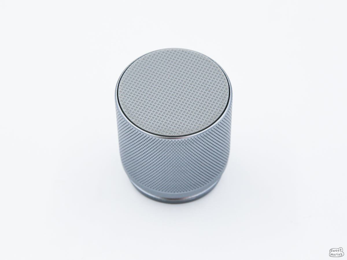 The Easy Adjust Hand Grinder has a rubber bottom to keep it in place.