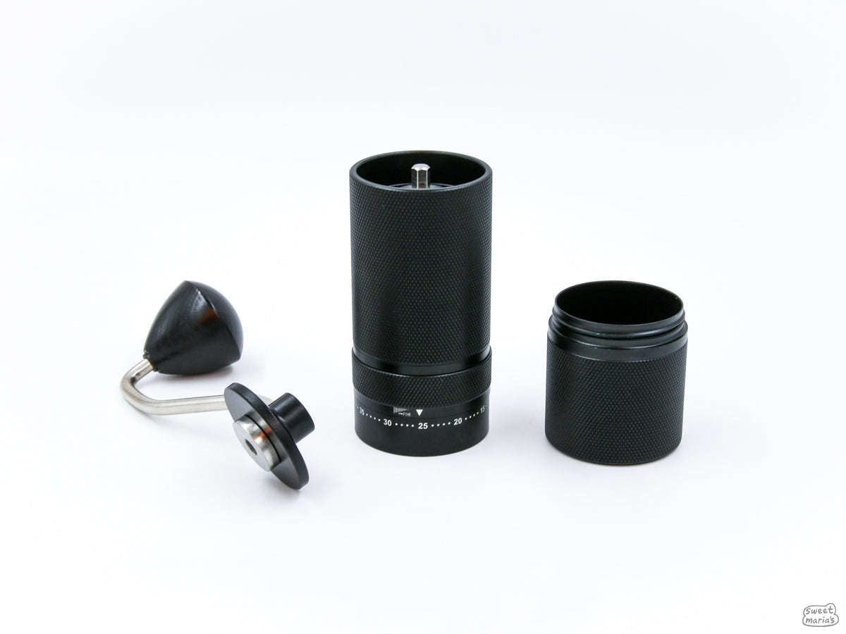 The Easy Adjust Hand Grinder with SS Burrs can break down into the handle, burr holder and grind cup.