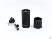 The Easy Adjust Hand Grinder with SS Burrs can break down into the handle, burr holder and grind cup.