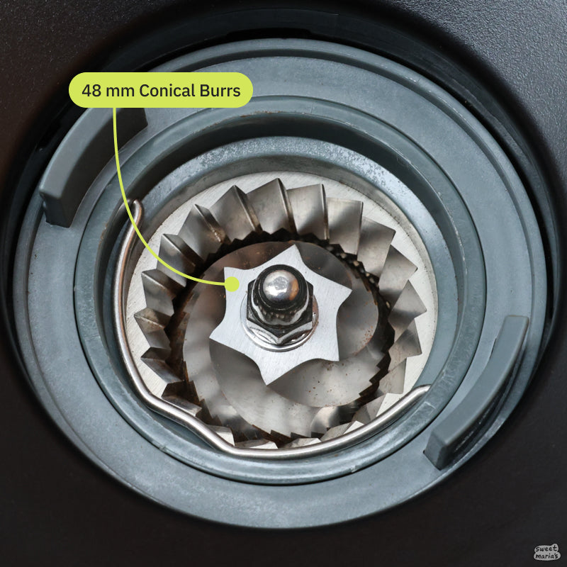 A close up of the 48mm conical burrs on the Fellow Opus 2 Grinder.