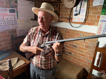 Farm manager Victor shows us the antique shotgun that came with the farm when the Benevente family bought La Florida 70 years ago.