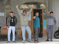 Aulia is 2nd from right, posing with friends and colleagues at the new mill that's processing his coffee in Takengon.
