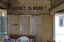 This is actually from a honey coop, not coffee! But the "Honey is Money" message still applies.