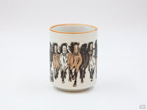 The Wild Horses Mug features nine horses, a symbol of good luck!