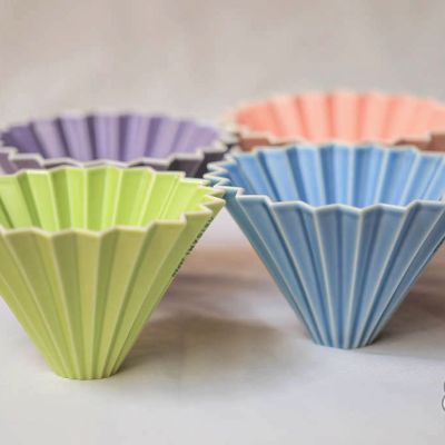 The Origami Ceramic Coffee Dripper, Size Medium, can use Hario V60 or Kalita Wave type filters