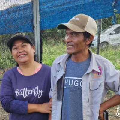 Coffee couple Pak Keiza (left) and Ibu Mega (right), who contributed to this coffee, at their processing site in Lintong.