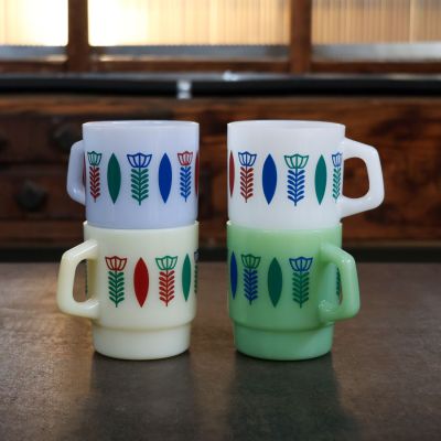 The Ethiopia Sini Design Glass Mugs are made of thick, opaque colored glass.