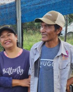 Coffee couple Pak Keiza (left) and Ibu Mega (right), who contributed to this coffee, at their processing site in Lintong.