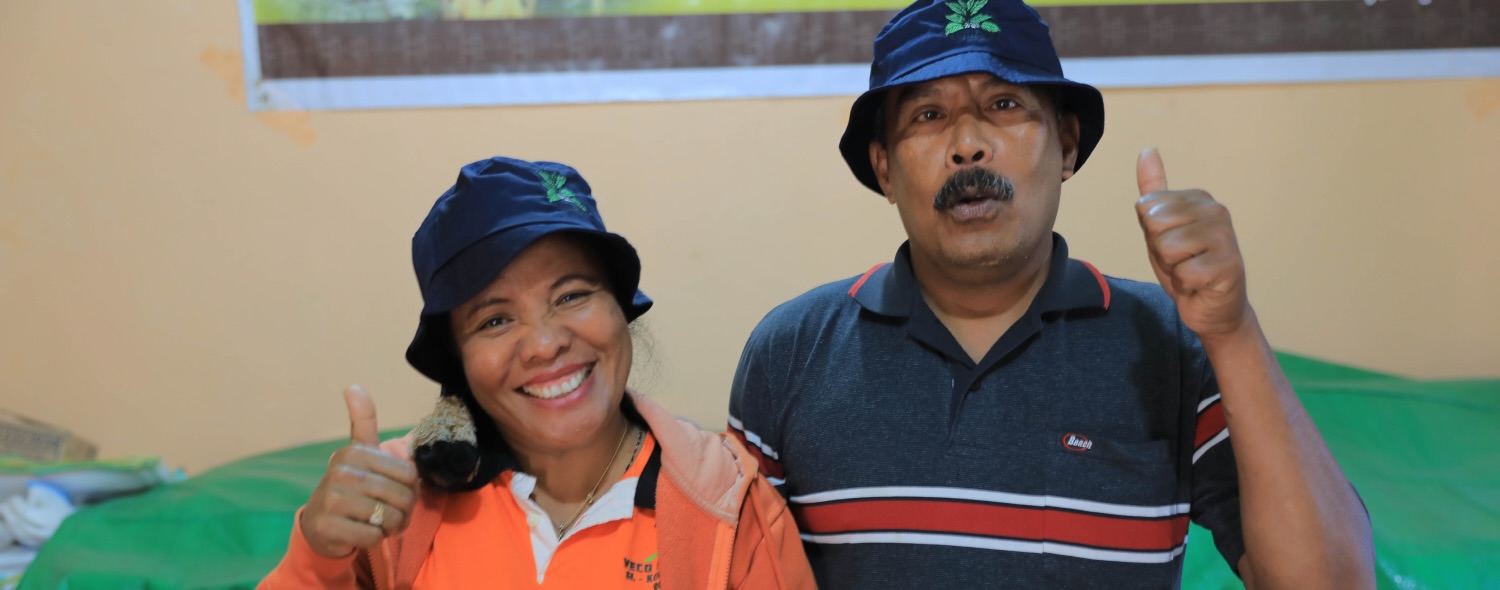 Marselina and Albertus of the Primavera coop pose for a photo. Check out our Indonesian coffee offerings.